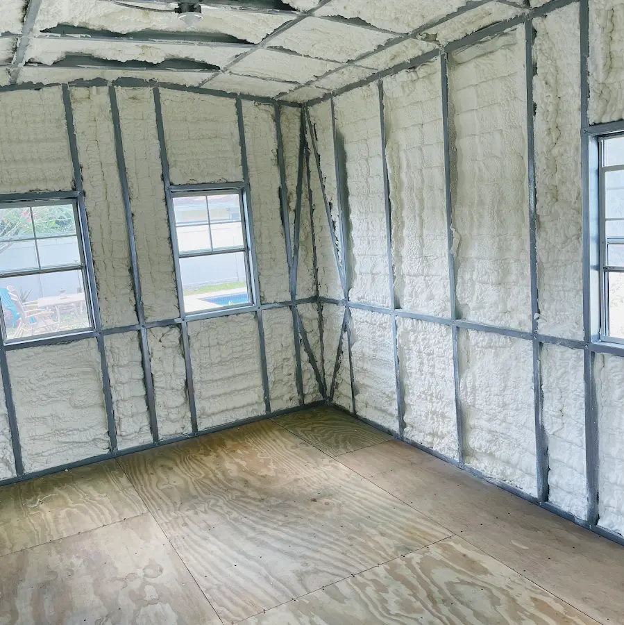 Closed-cell spray foam insulation applied to wall cavities in a residential project in Harrisburg