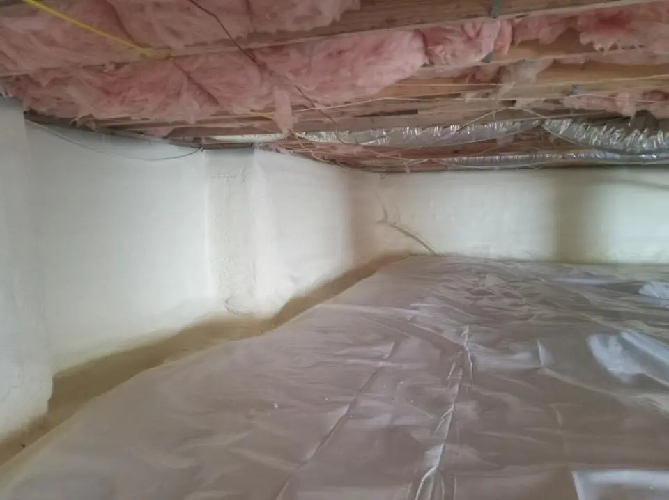 Crawl space encapsulation with closed-cell spray foam for Commercial Roof Restoration in Harrisburg